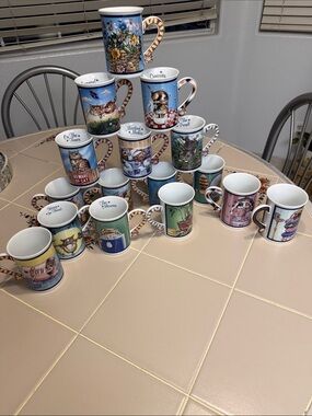 The Danbury Mint porcelain mugs set of 16.